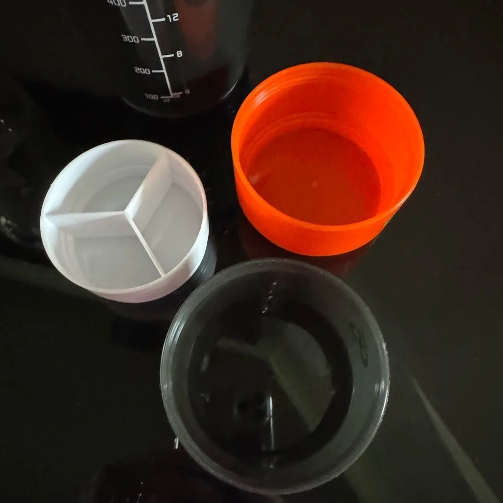 LiveGood Black Shaker Bottle with two compartments for supplements.